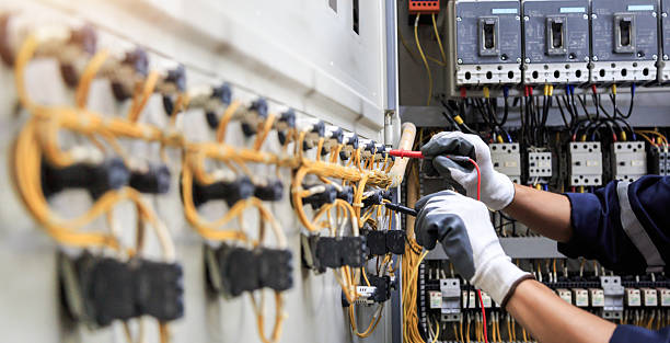 Professional Electrician technician working in Holliday, TX